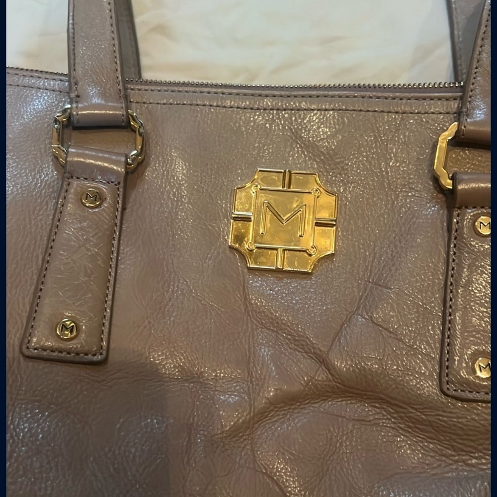 Classic Brown and Gold Shoulder Bag with Structured Design
